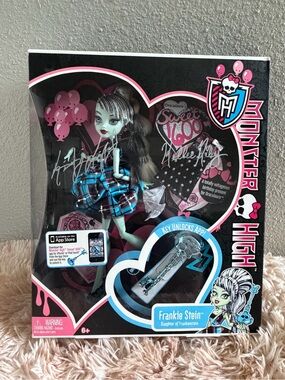 Monster High Frankie Stein Doll in Black, Blue, White, Pink Packaging